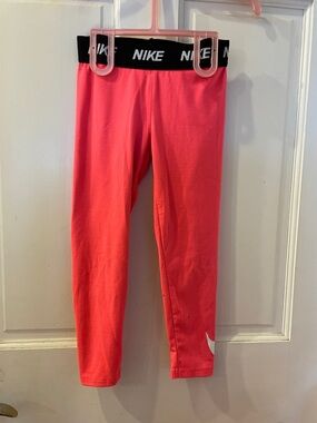 Nike Kids Coral Pink Leggings with Black Logo Waistband